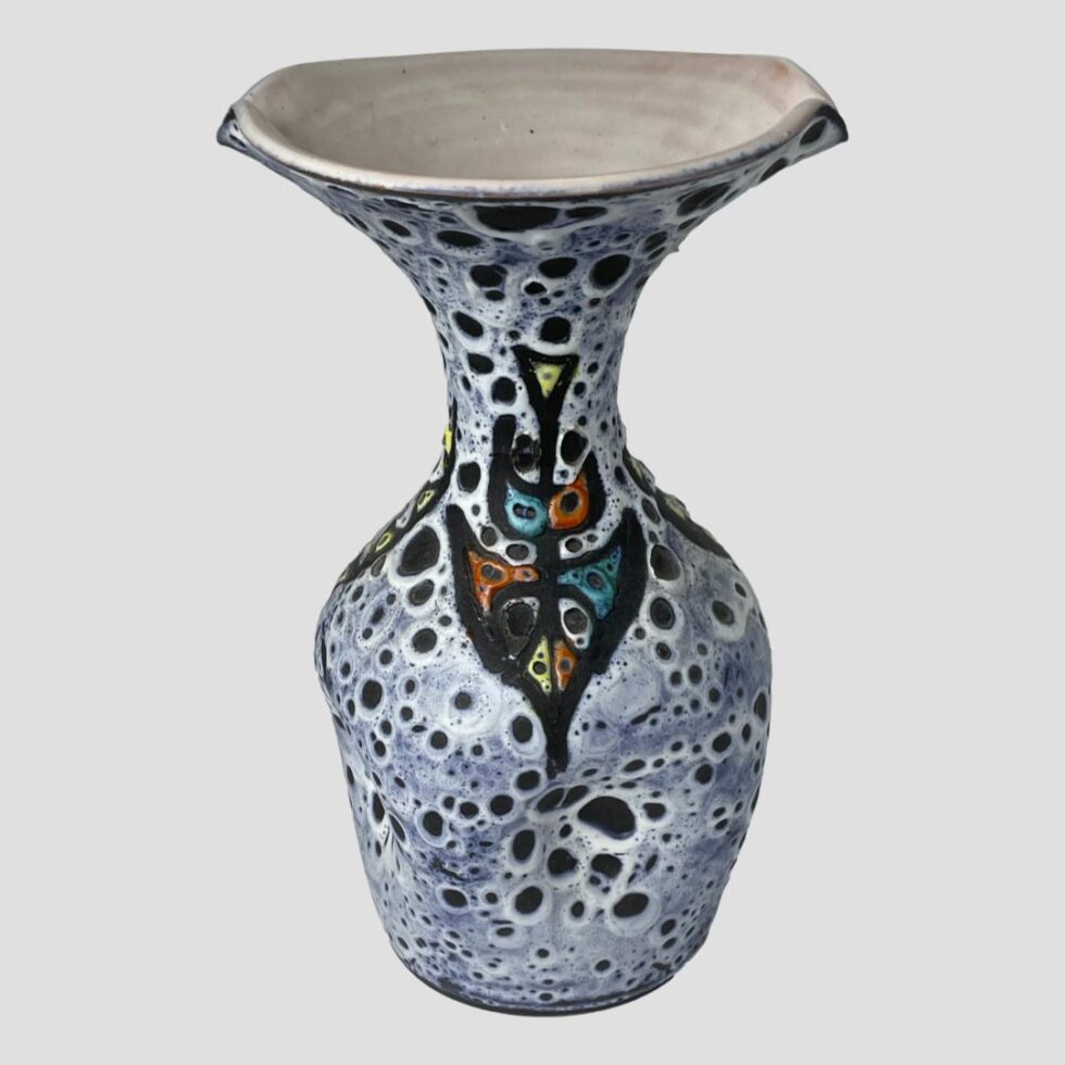 Photo of the back side of the vase - not that there is a back and front this side has considerably less decoration in matt. The angle for this shot is a little raised so part of the wide top is visible at the top.