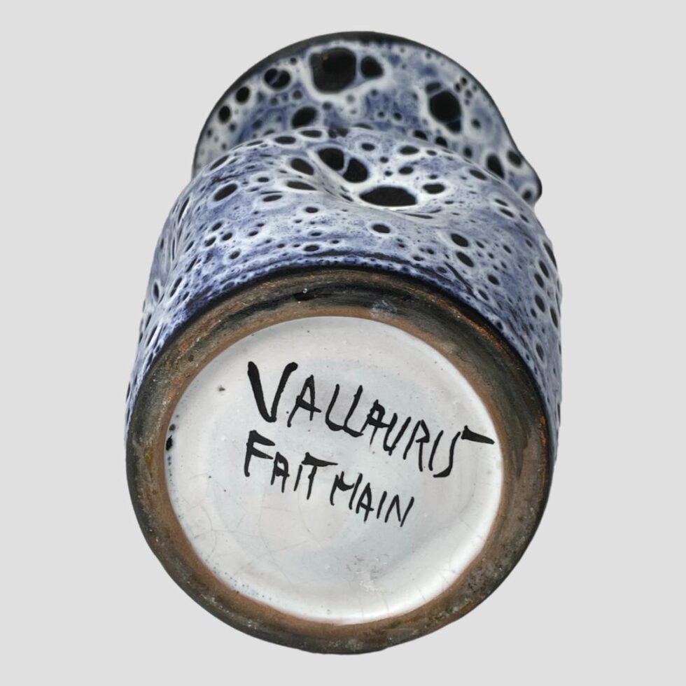 Photo of the base of the4 Vallauris fat lava vase showing Vallauris mark and Fait Main