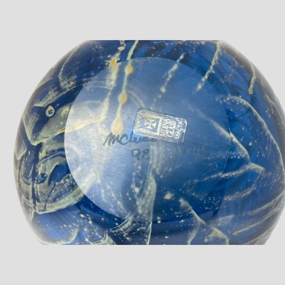 Photo of the base of the vase showing the Mdina signature and assumed year 98 and the original Mdina sticker.