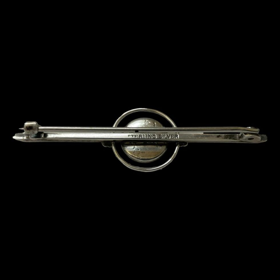 Photo of the back of the Bernard Instone silver brooch.