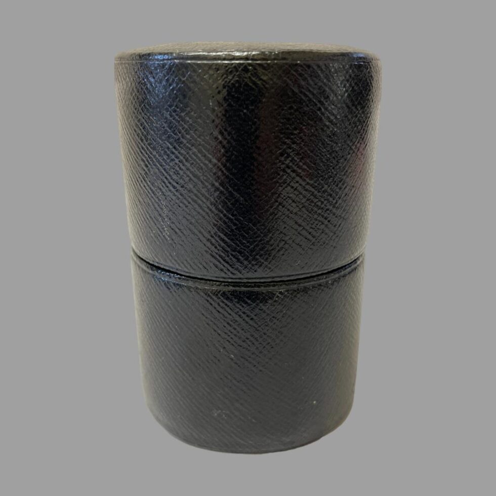 Photo of the case only which is shown closed and from an eye level. The level has minor wear and in good overall condition.