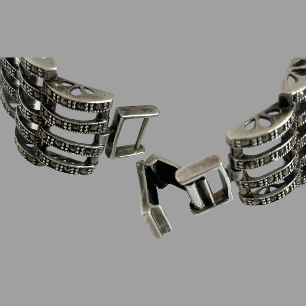 Close up photo of the clasp ends shown open.