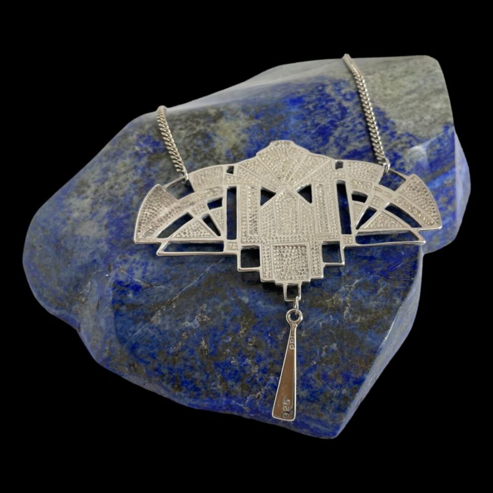 Photo of back of Deco style silver necklace showing the back.
