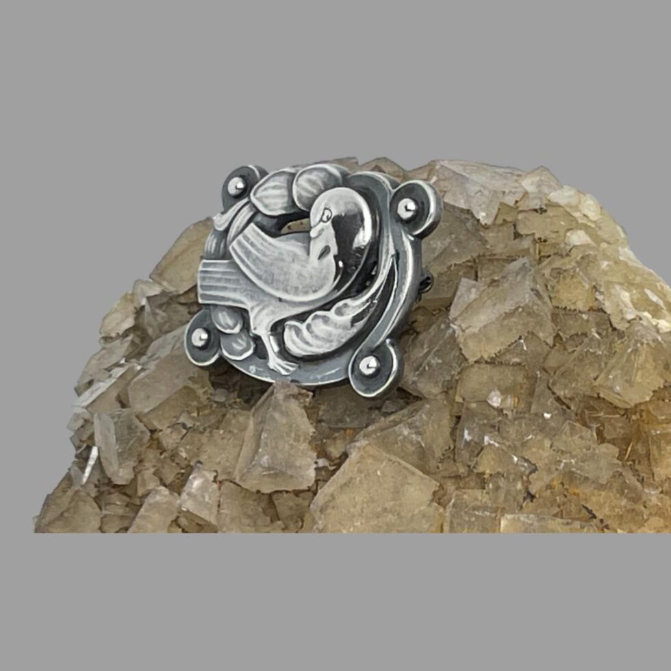 The Jensen dove brooch is now facing the left. Still on the ricer quartz.