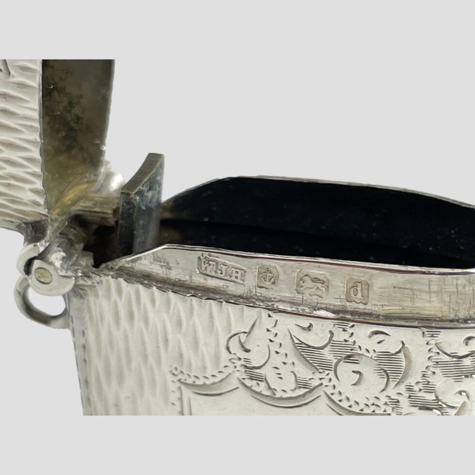 Close up photo of the full hallmark on the inside rim of the vesta