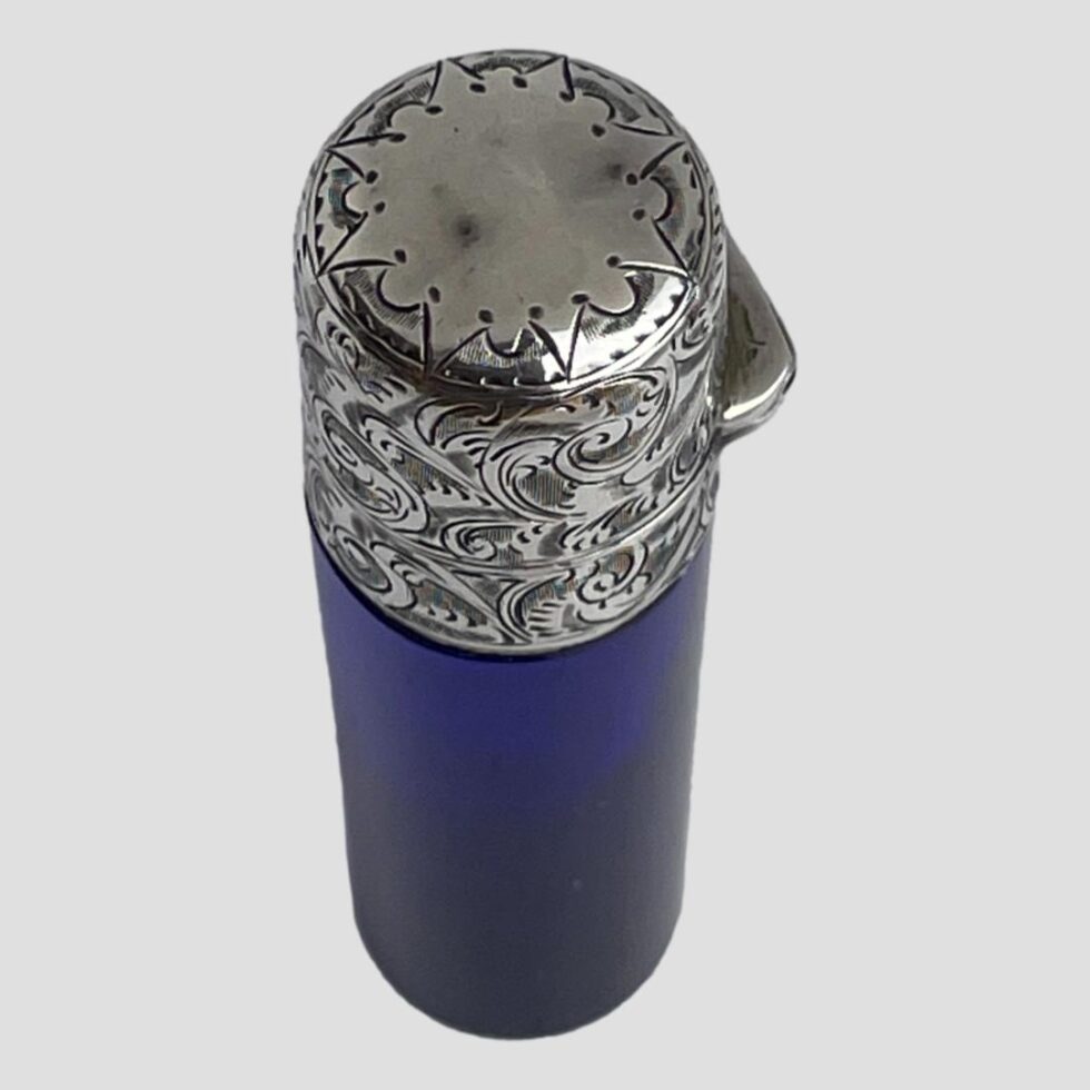 Photo looking down at the top of the lid from a diagonal angle to show the minor dinks in the top of the lid.