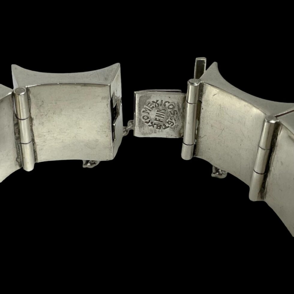 Close up photo of the back of the clasp showing the hallmark.