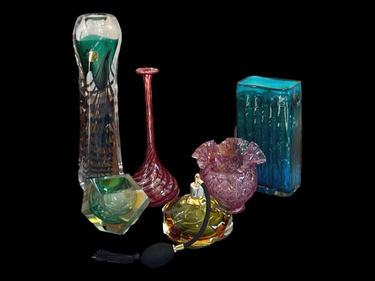 Glistening glass in all its glory A photo showing a selection of colourful glassware pieces - nearly all the colours of the rainbow.