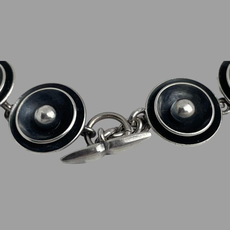 Close up photo of the clasp area of the bracelet which is shown closed.