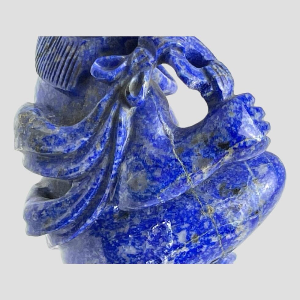 A close up of the repaired work on the right arm area.