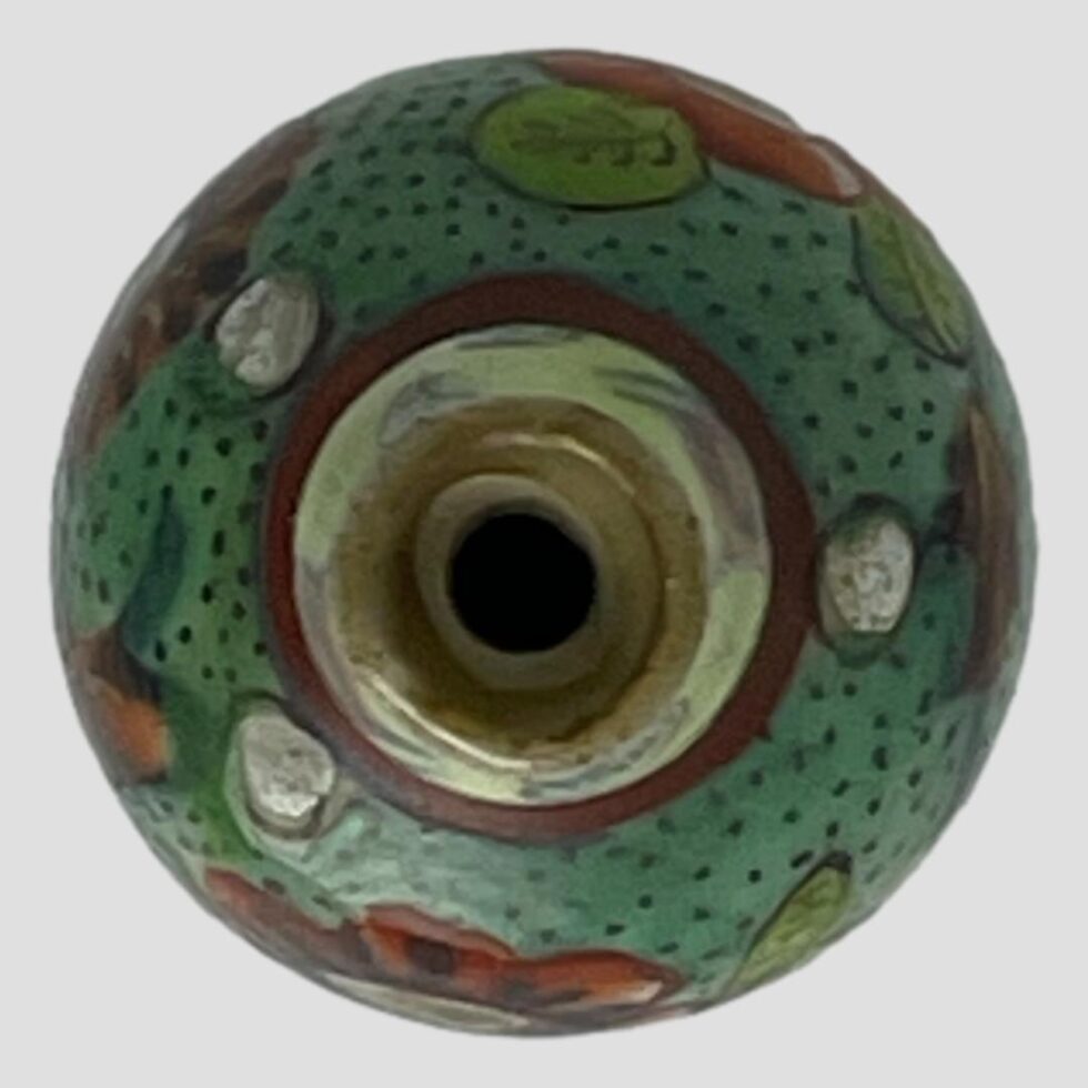 Photo looking straight down at the miniature vase from above.