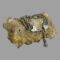 Main photo of Victorian Albertina chain bracelet displayed draped over a rock of natural river quartz with the bracelet front with the heart ends, clasp and tassel in the foreground.