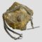 Main photo of repurposed Albert chain necklace displayed draped across a rock of natural river quartz. The T-bar is hanging off the rock on the right and the dog clip clasp shown closed is in the centre foreground.