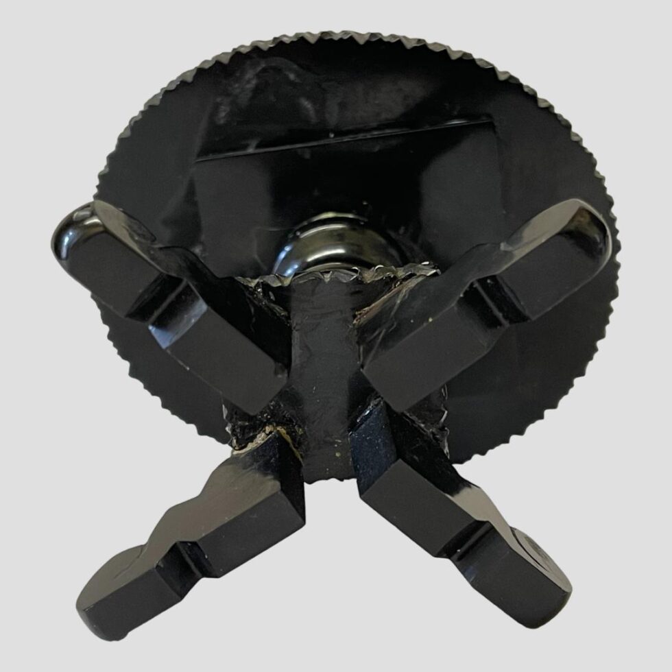 Photo of the base of the jet table showing a probable repair area above the bottom left foot.