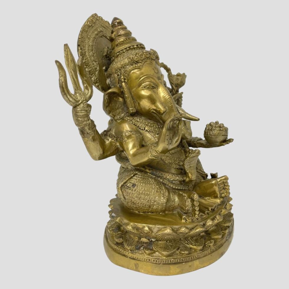 Photo of Lord Ganesh this time posed facing towards the bottom right corner.