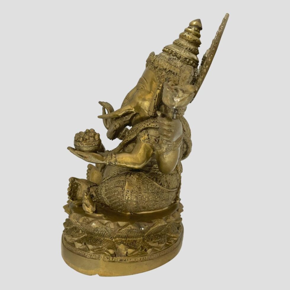 Lord Ganesh from a side angle. He is faced to the left.