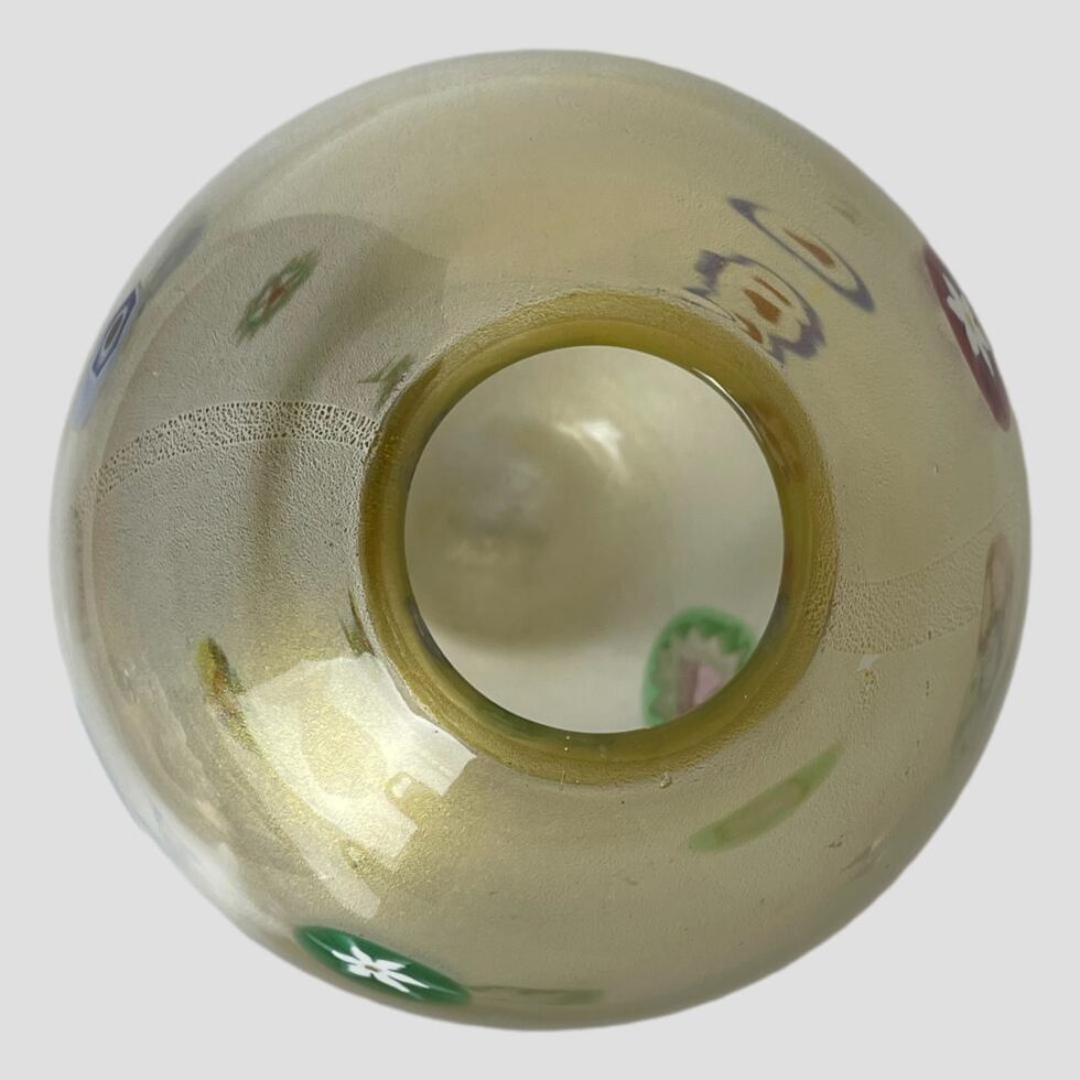 Photo looking straight down into the mouth of the vase from above.