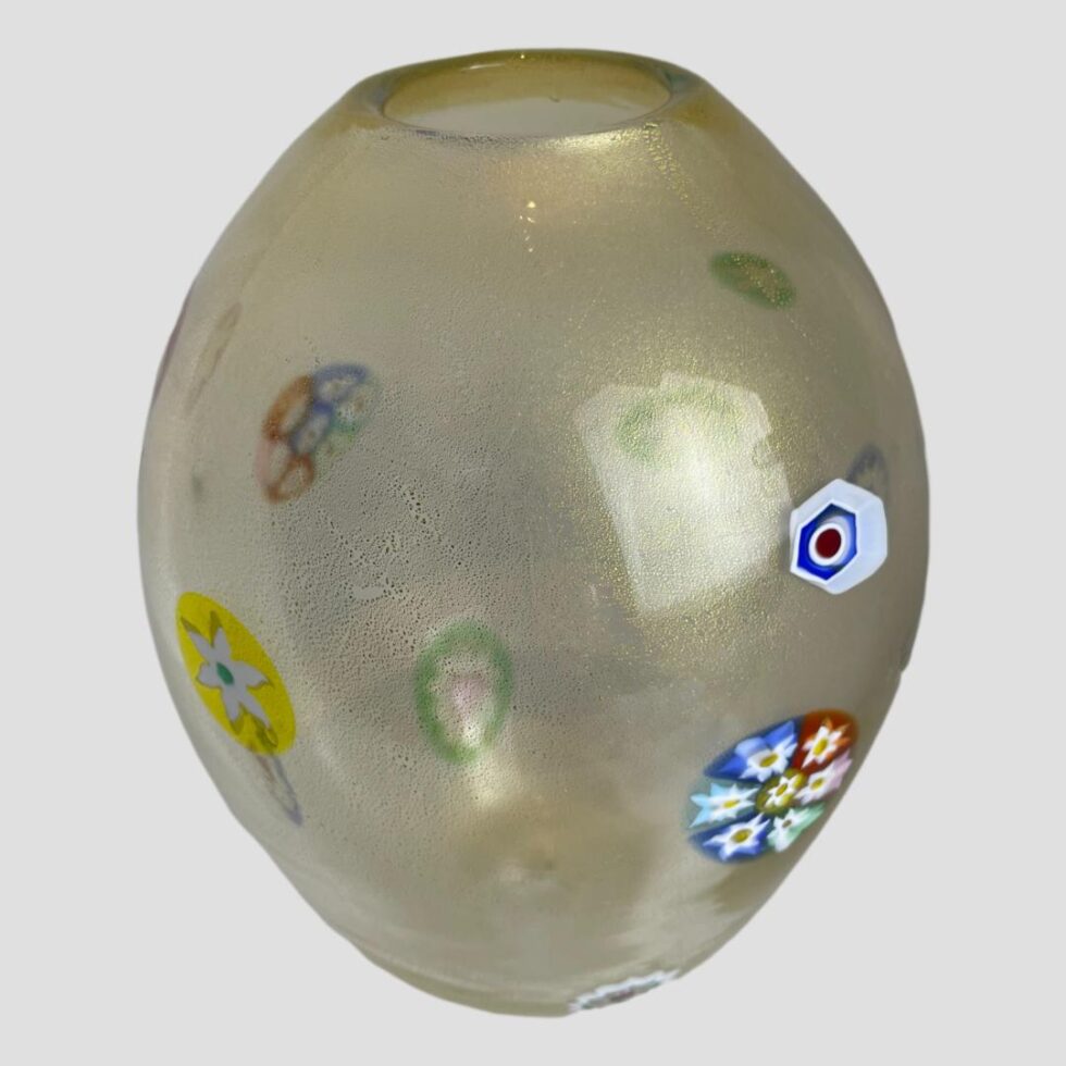 Photo of Murano vase from another angle showing different murrine pieces set within the glass.