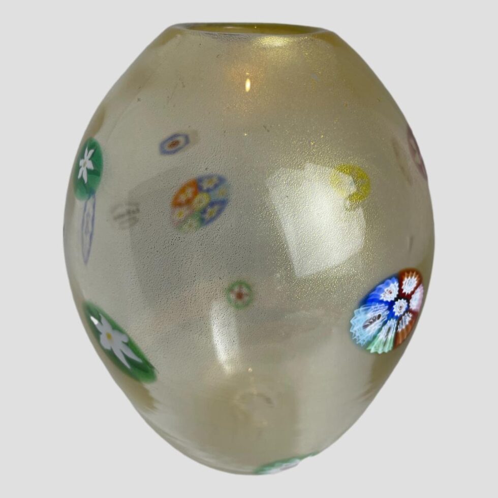 Final side showing yet more murrine glass pieces set within the glass vase.