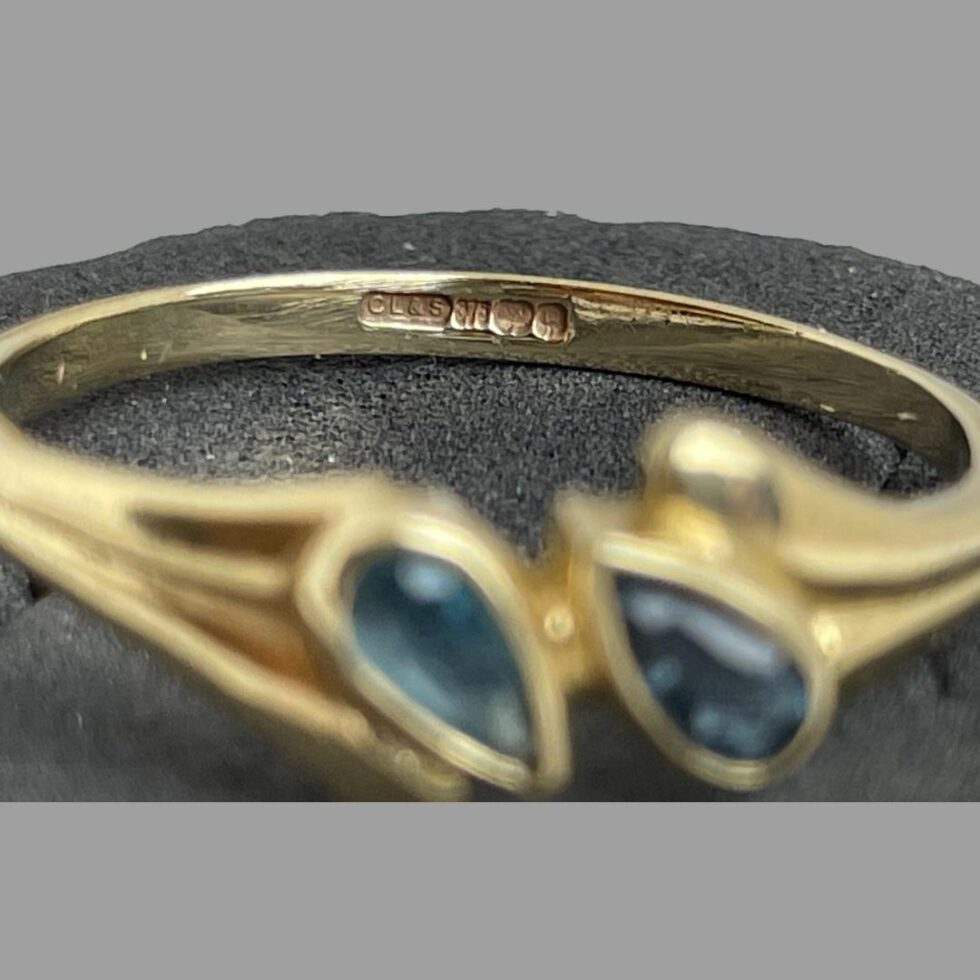 Close up photo of the hallmark on the inside band of the ring.