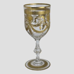 Main photo of St Louis Congress goblet seen from almost an eye level in its entirety. The side displayed shows the swag at centre with lions head discs either side. This is a very grand glass and would require some grand burgundy to put it into good respectful use!