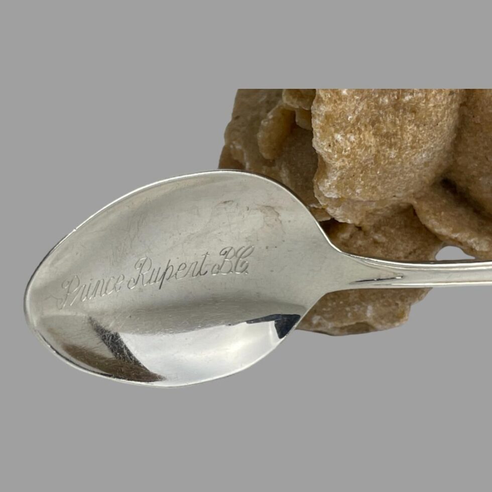 A close up photo of the inscription on the spoon bowl reading 'Prince Rupert, BC'