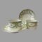 Main photo of antique Paris cups &saucers displayed against a grey background. One cup on the left is on its saucer with its handle to the right and other cup is next to it with its saucer displayed upright behind it. Very sweet design adorn these pieces. Gilt rimmed with a row of small circles with green outer line below. Beneath these circles is a row of foliage, mainly leaves with green at top and yellow below with tiny berries. Then there is a garland of same foliage hanging in a garland with small yellow petaled flowers in each dip space and a yellow ribbon at the top of the garland which has a short line of foliage hanging below it. These cups and saucers have more to show the more you look.