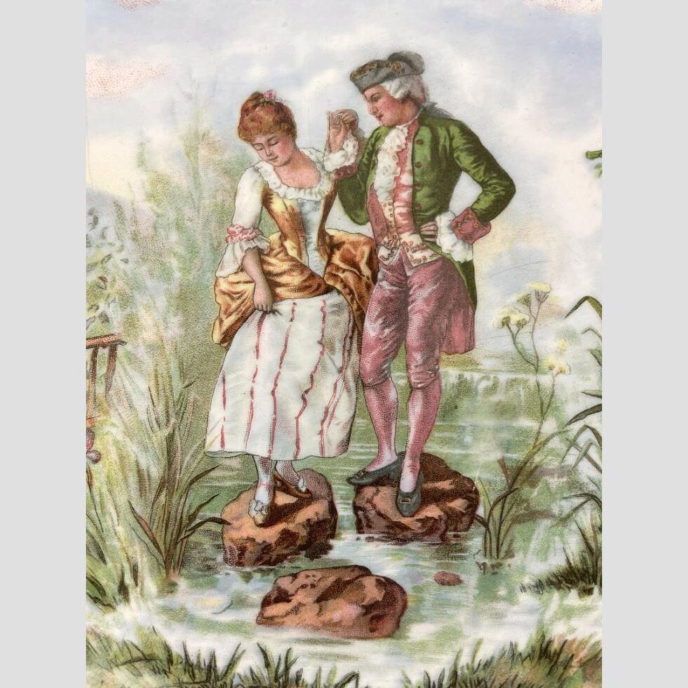 A close up photo of the courting couple. Bother pink faced and looking very much in love although somewhat a little precarious standing on the rocks in the large pond. Ahh such is the nature of love!