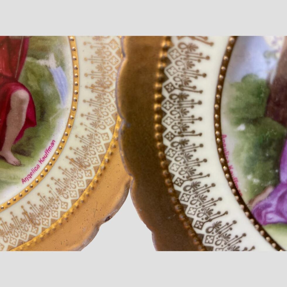 Close up photo of Angelica Kauffman signature in red on both plates.