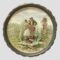 Main photo of Limoges metal rimmed tray looking straight on at the lovely romantic image at the centre. The standing on the rocks in the water may be a hidden message of risk taking or following each other to all ends. Another classical piece with many tales that can be told. The garden has several species of flora. The image is so elaborate and fine that it could be hung on the wall like a painting with the metal rim acting as a frame. Some minor scratches but overall in very good condition for a porcelain tray of this age.