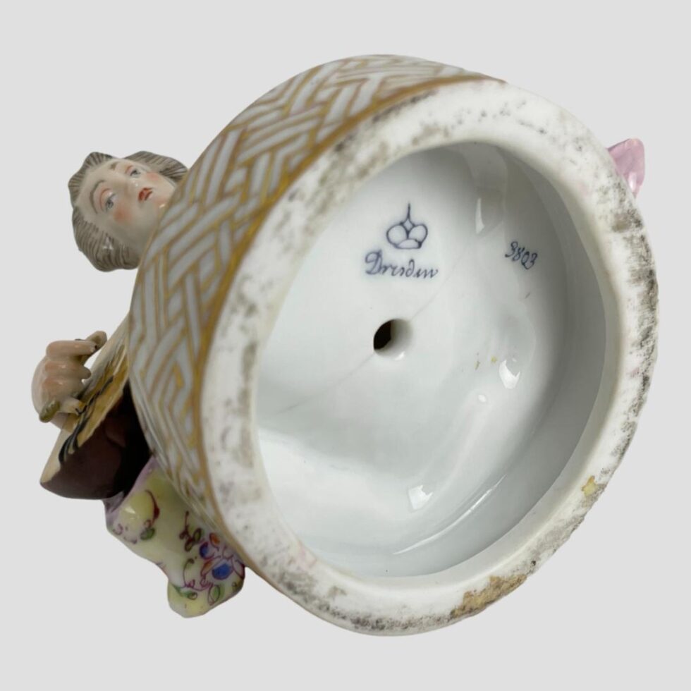 Photo of the base of geisha with shamisen showing the Dresden mark and numbering.