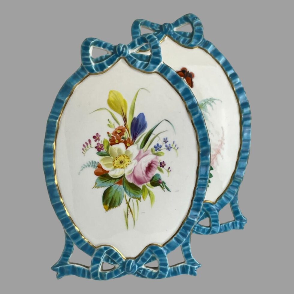 Photo on Minton porcelain pictures this time with the floral picture in the foreground to the left and the ferns and bugs one just peeking out from behind and to the right.