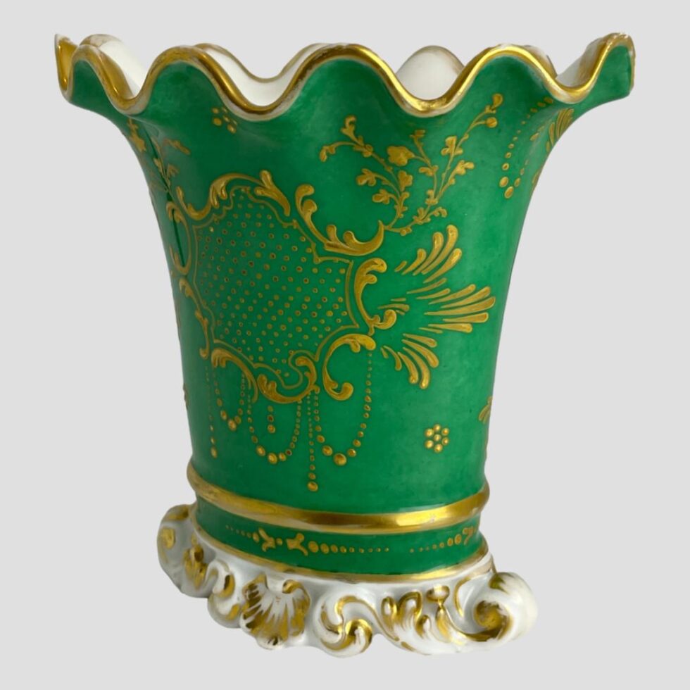 Photo of back area of Paris scallop edged vase with the floral window facing towards the top right corner. This side is just the vibrant green with pretty gilt work arrangement including a pretty frame with a lot of jewels (dots) within and dangling below.