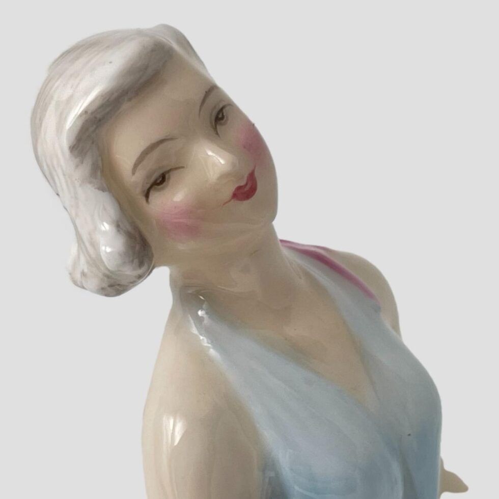 A close up shot of the pirouette figures dreamy happy face. The Marilyn Monroe likeness is really quite evident.