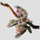 Main photo of trovelore peace dove brooch displayed leaning against a twig of cherry in the background with the dove flying to the right. The beadwork and the embroidery of this piece is exquisite. The dove is a creamy white base colour with embroidered flowers and leaves embellished with different colour bead. It is a thing to bring much joy on beholding. Lovely gift for someone special or yourself!