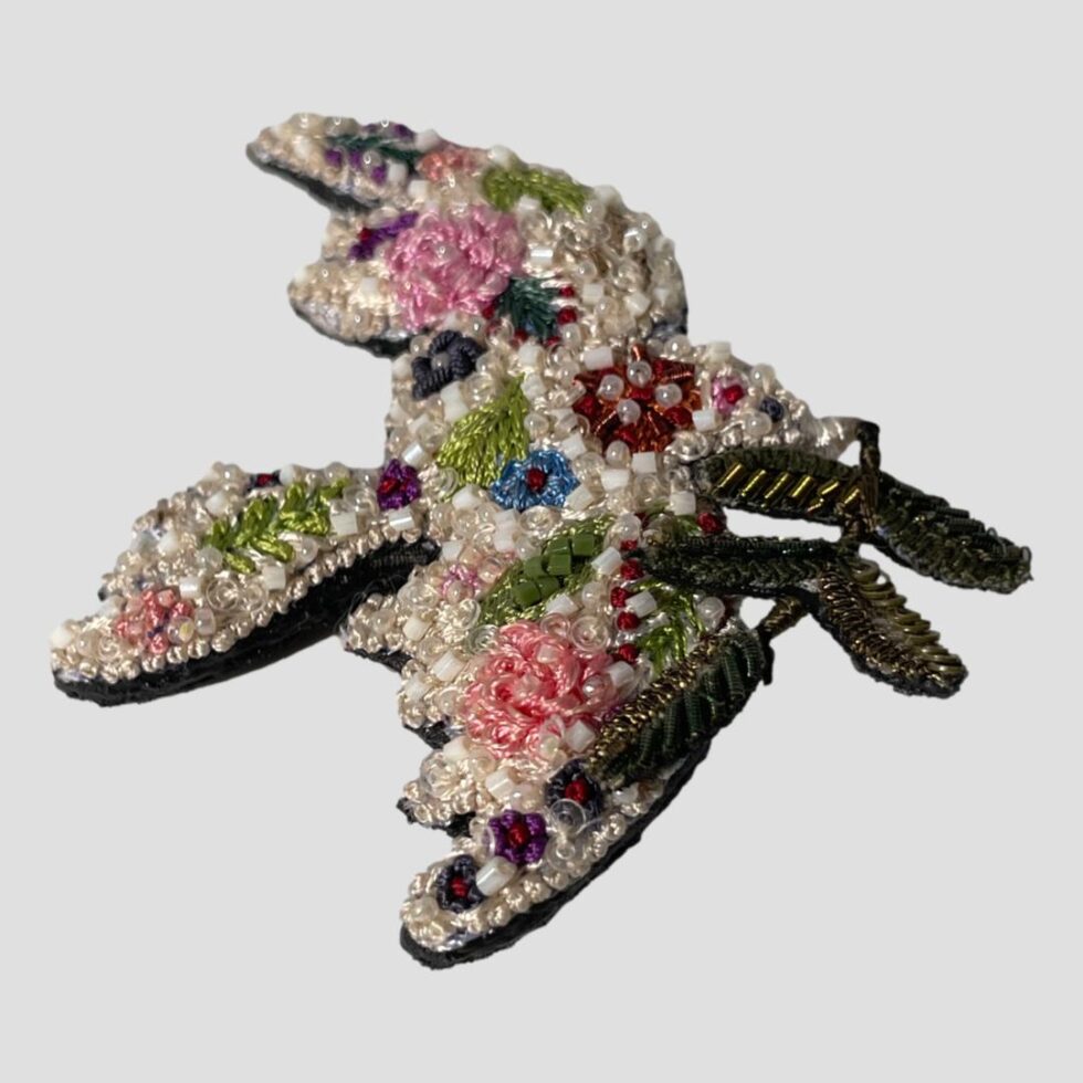 Another photo of the trovelore peace dove brooch this time on a flat surface and in a little more close up.