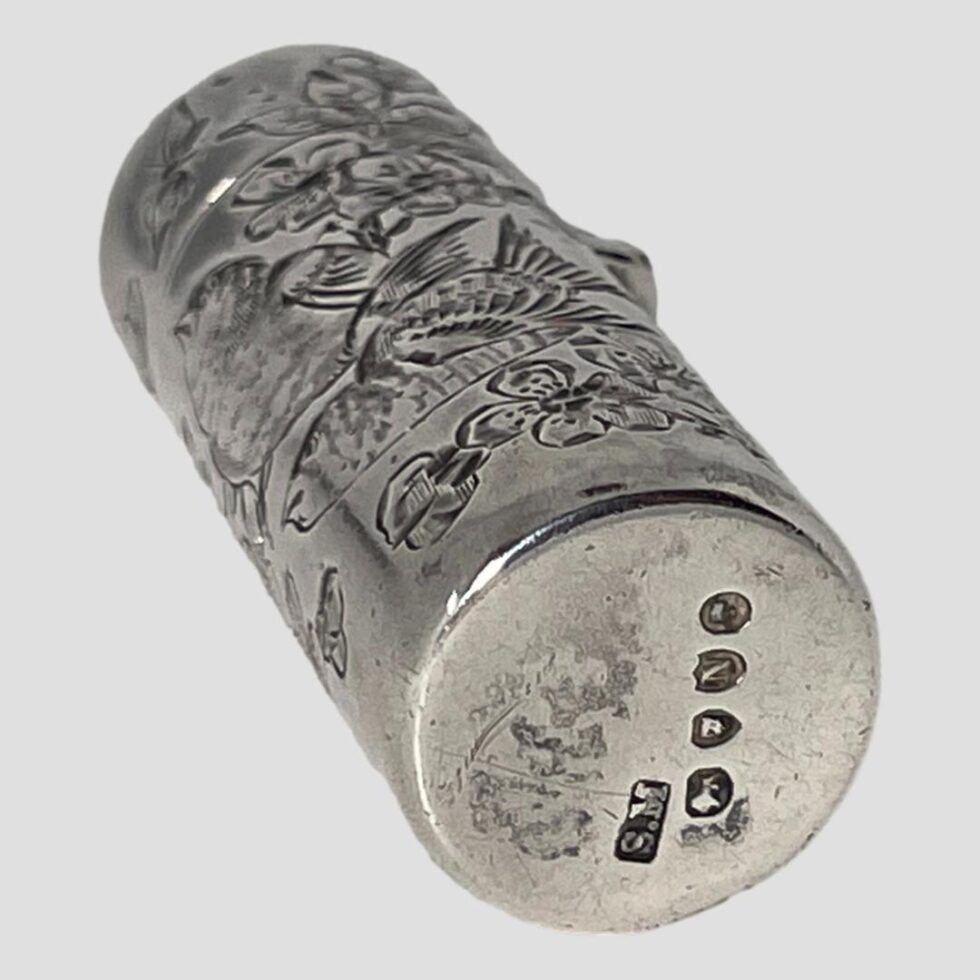 Photo of the base of the c1888 silver scent bottle showing the full hallmark and the makers initials.