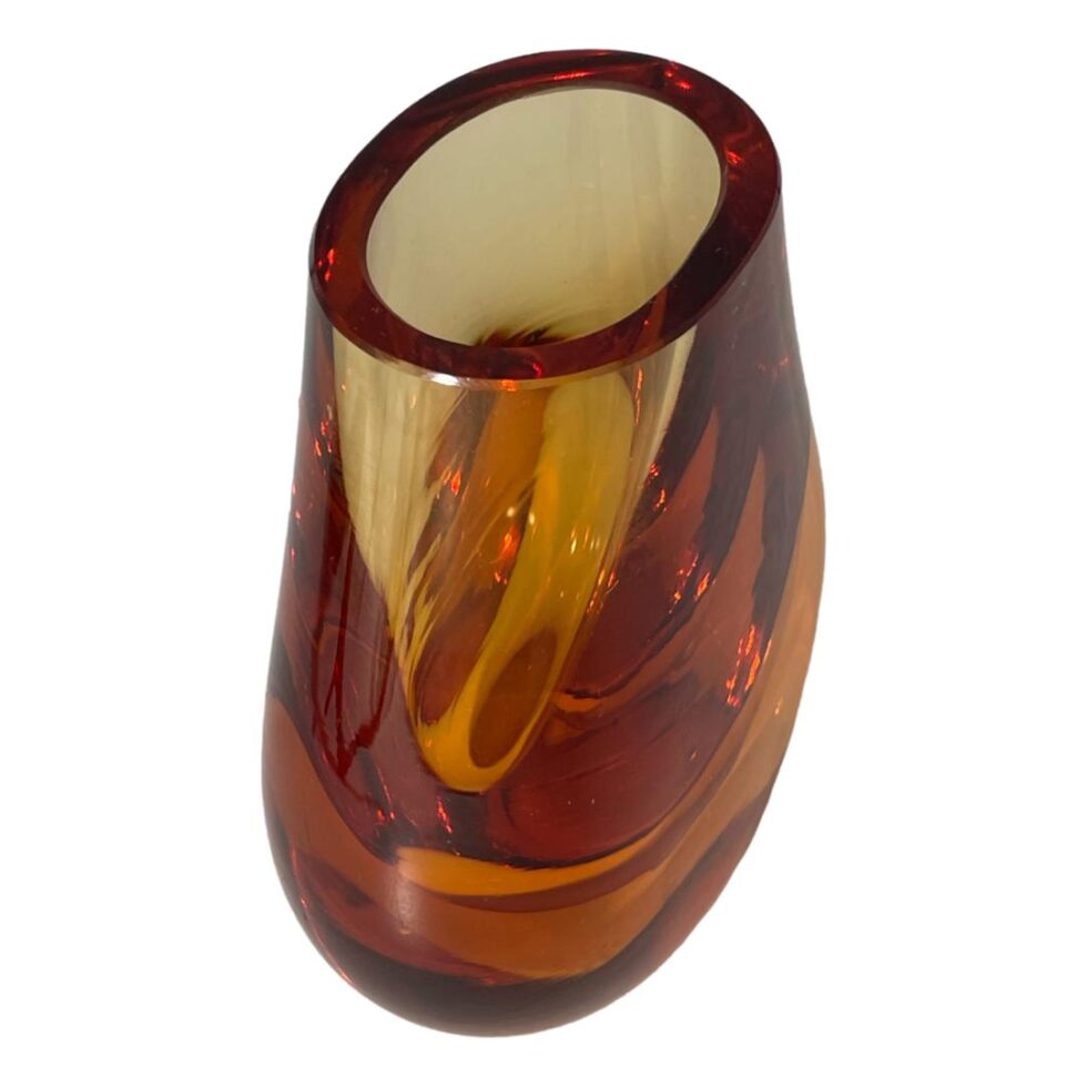Photo of the Whitefriars hambone vase seen looking down from above with the vase posed diagonally with one wide side facing bottom right corner.