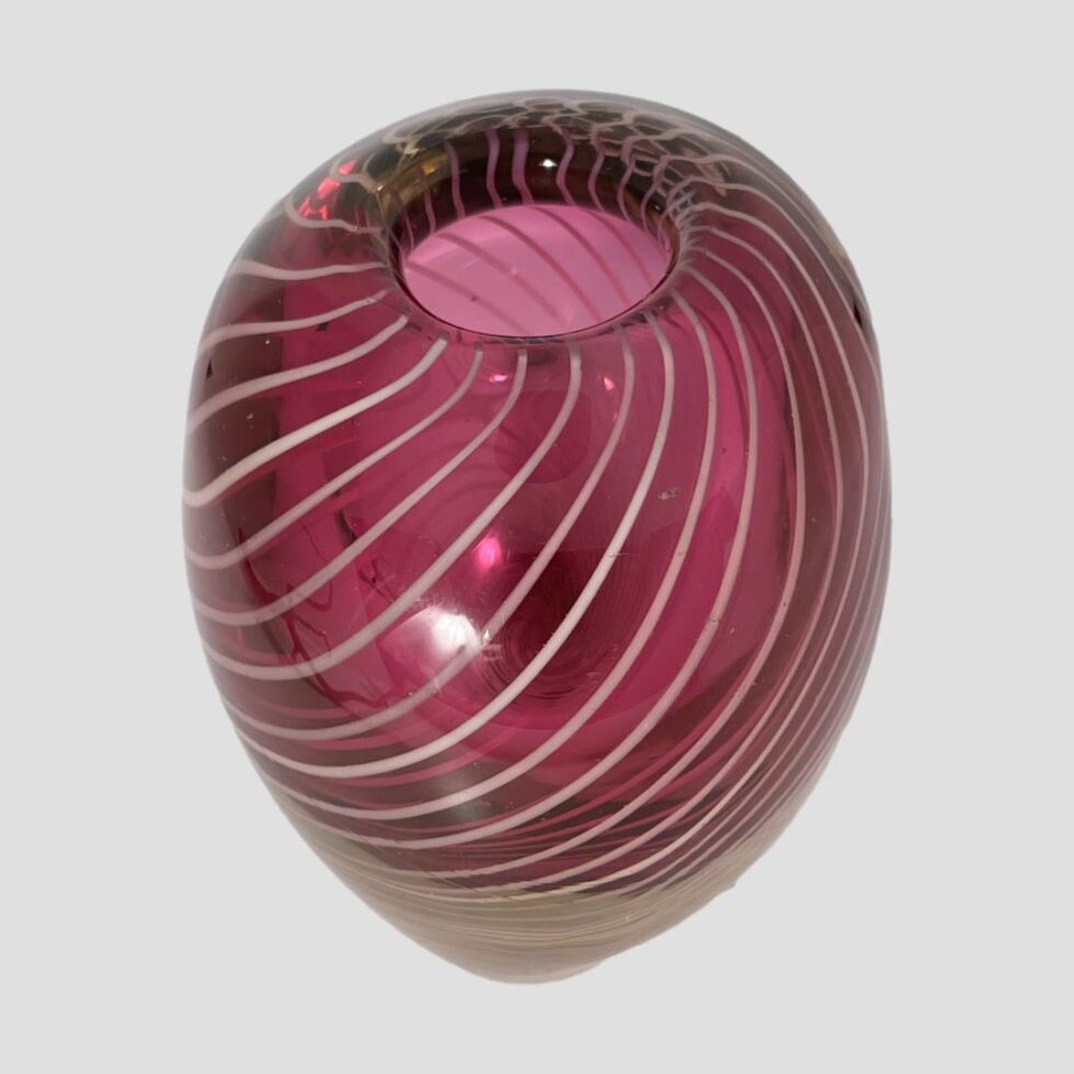 Photo of the 'zebra' vase seen from a side and slightly raised angle so the mouth at the top of the vase is visible. Although it has less than the width, there is still generous room within.