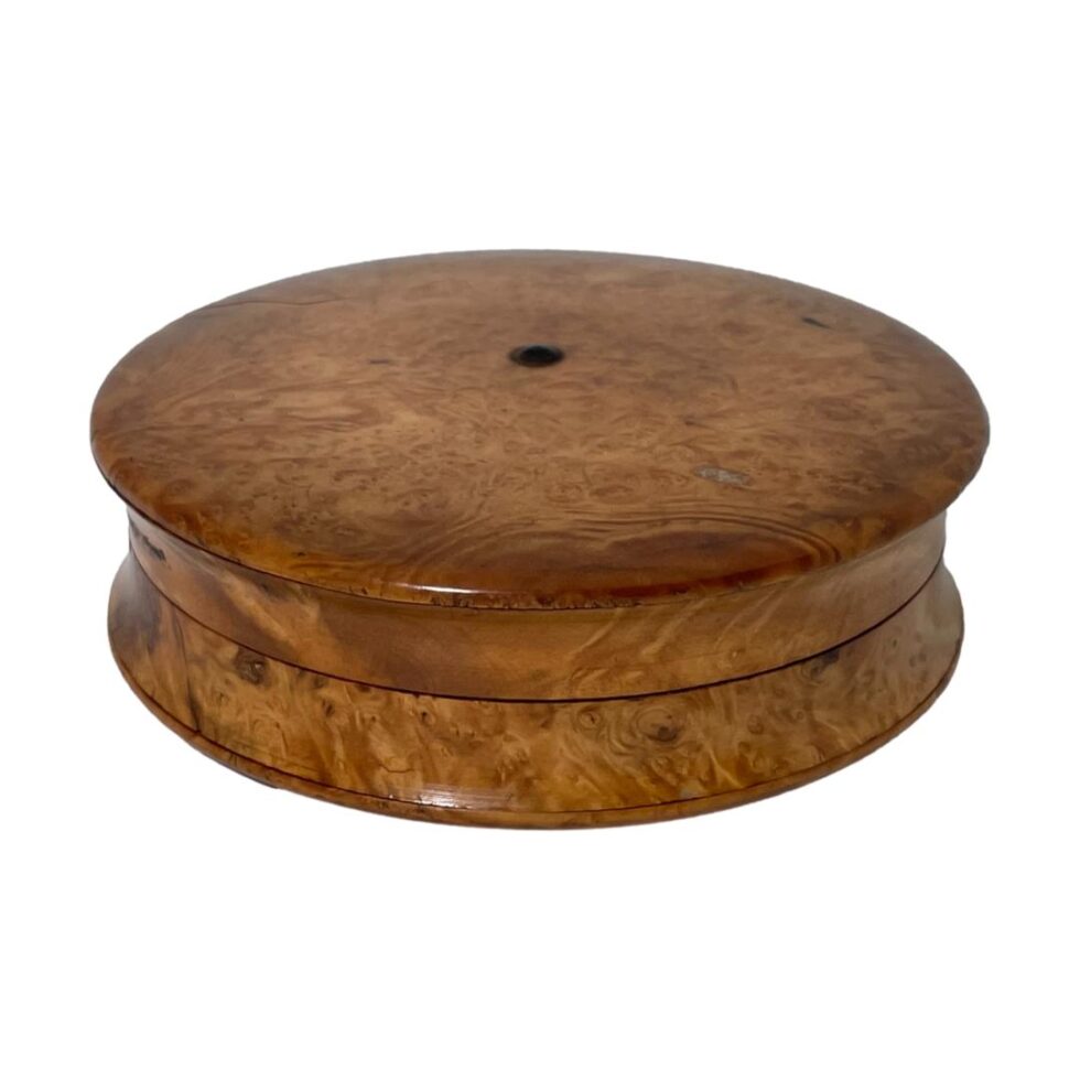 Main photo of turned birchwood snuff box in its complete form with all discs or trays stacked in place and closed. The birchwood has wonderful graining detail and is in good condition.