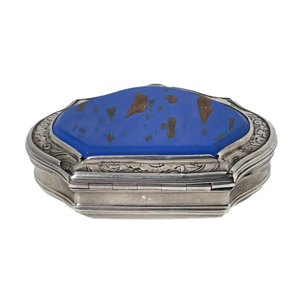 Photo of the aventuine glass lidded box seen from the hinged back side.