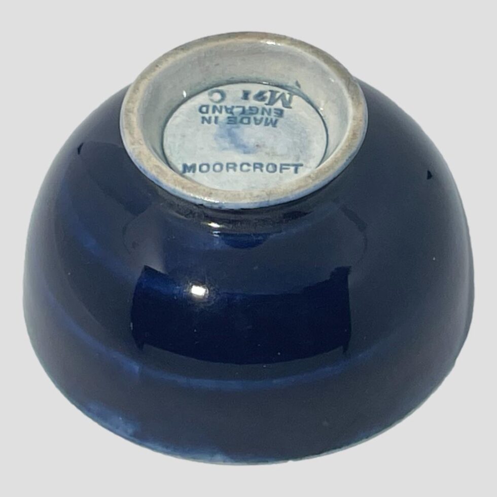 Photo of the Moorcroft wisteria bowl upturned to show the base.