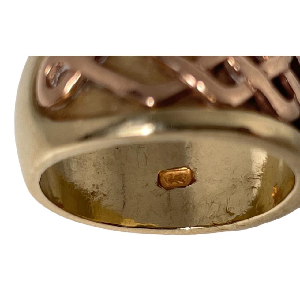 Close up photo of the dragon hallmark also on the inside band separate from the full hallmark.
