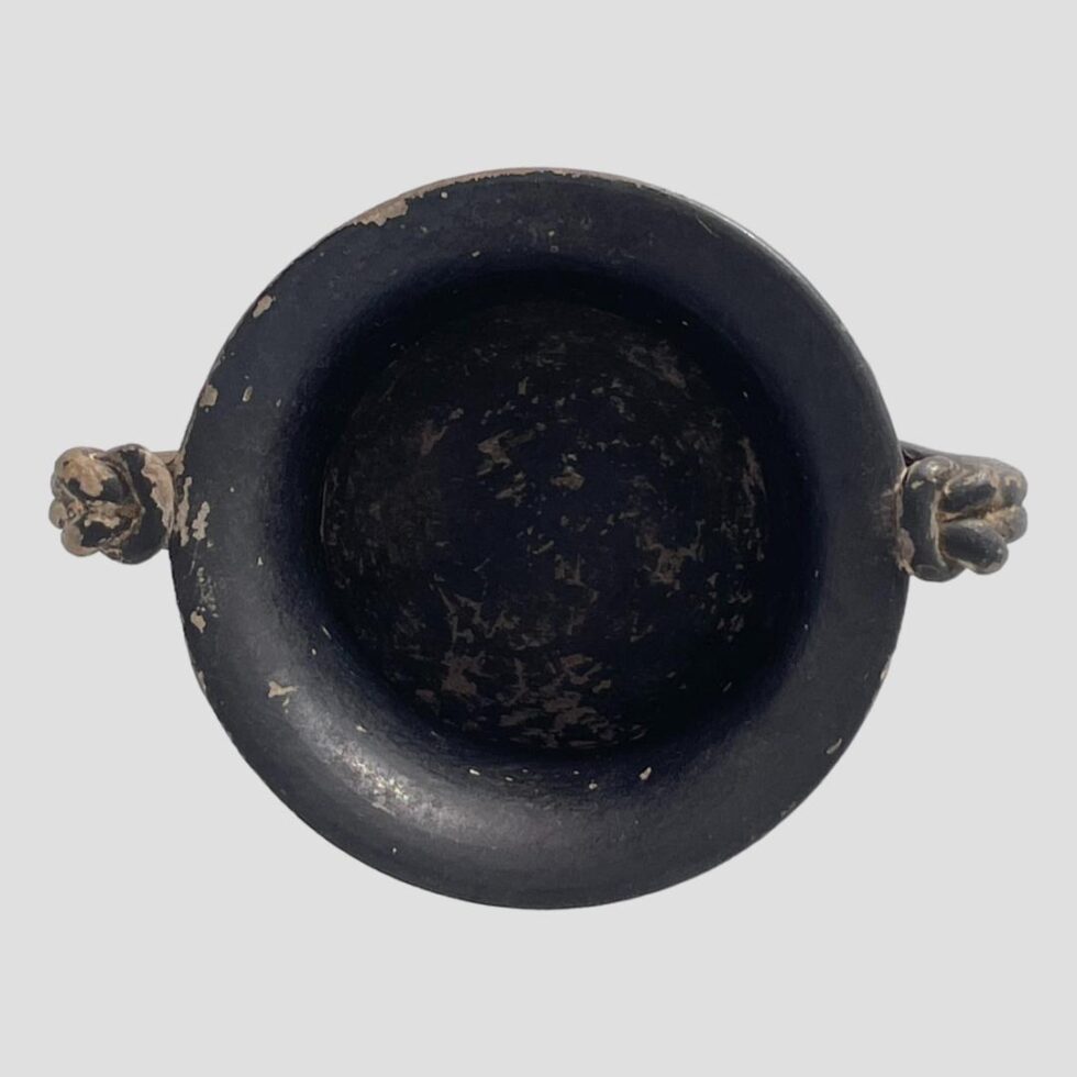 Photo looking straight down into the mouth of the Romano-Greek urn the inside is matt black as the outside with some wear and light flecks showing.