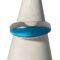 Main photo of Just Andersen enamel ring displayed on a white cone shaped stand with the ring front forward facing. The navette shaped turquoise blue enamel is very eye catching with the flaw in one end barely visible. The ring has quite a wide gallery in solid silver with the enamel sitting just at the front. A vert sleek, stylish and stunning ring!