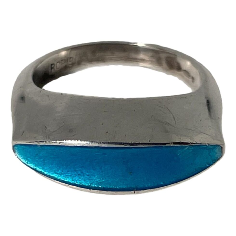 Photo of Just Andersen enamel ring still shown with front forward facing but this time from a raised angle looking diagonally down to show the depth of the solid silver gallery.