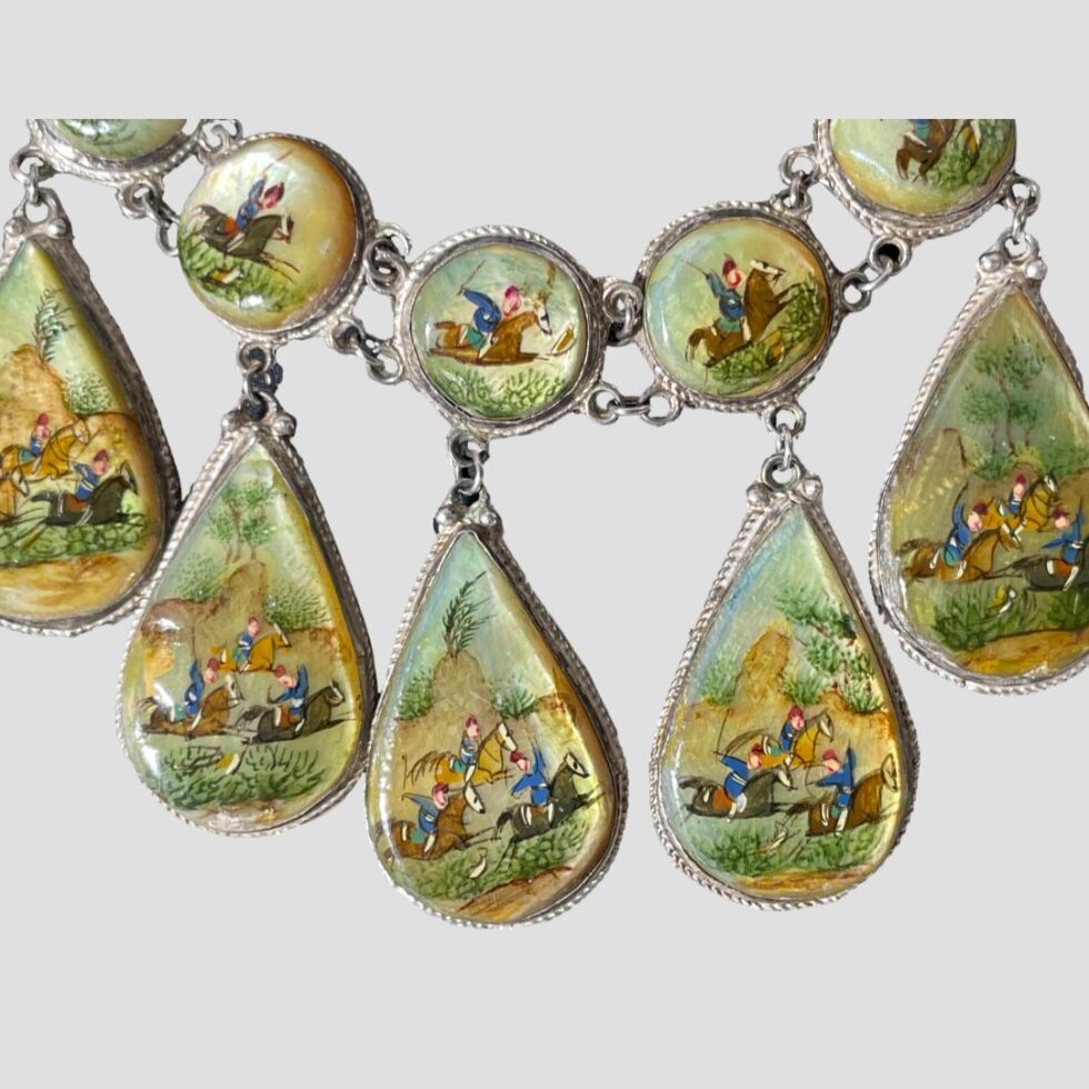 A close up of a few of the panels at the centre of the necklace.