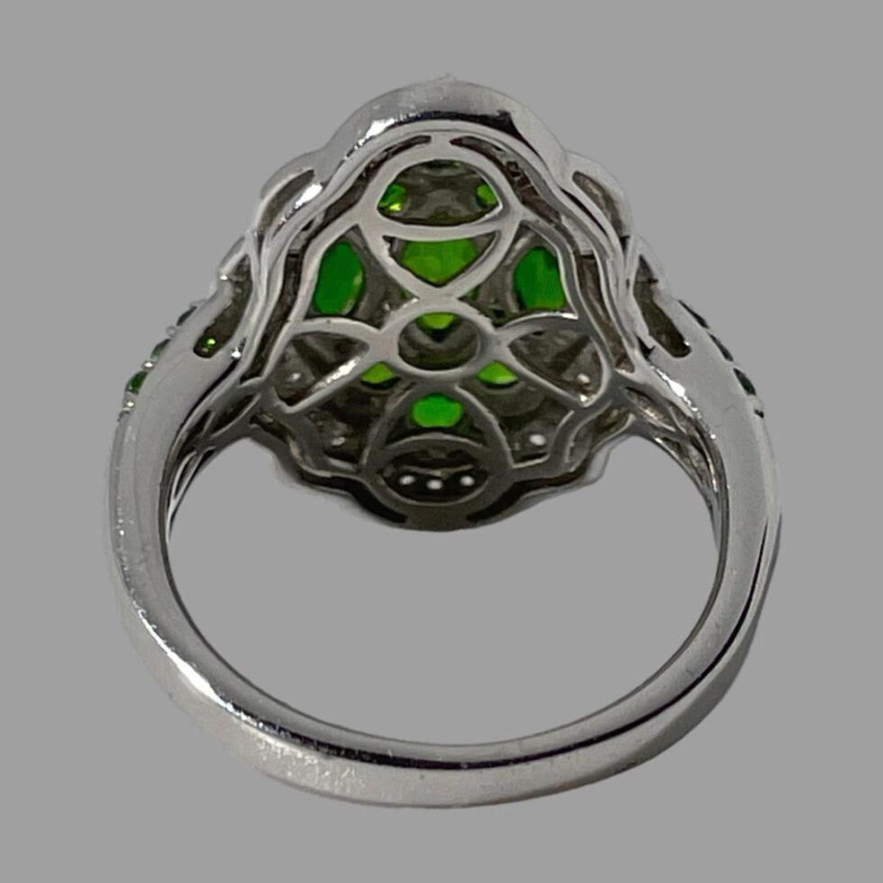 Photo of the back of the chrome diopside ring showing the setting for the stones from the back.