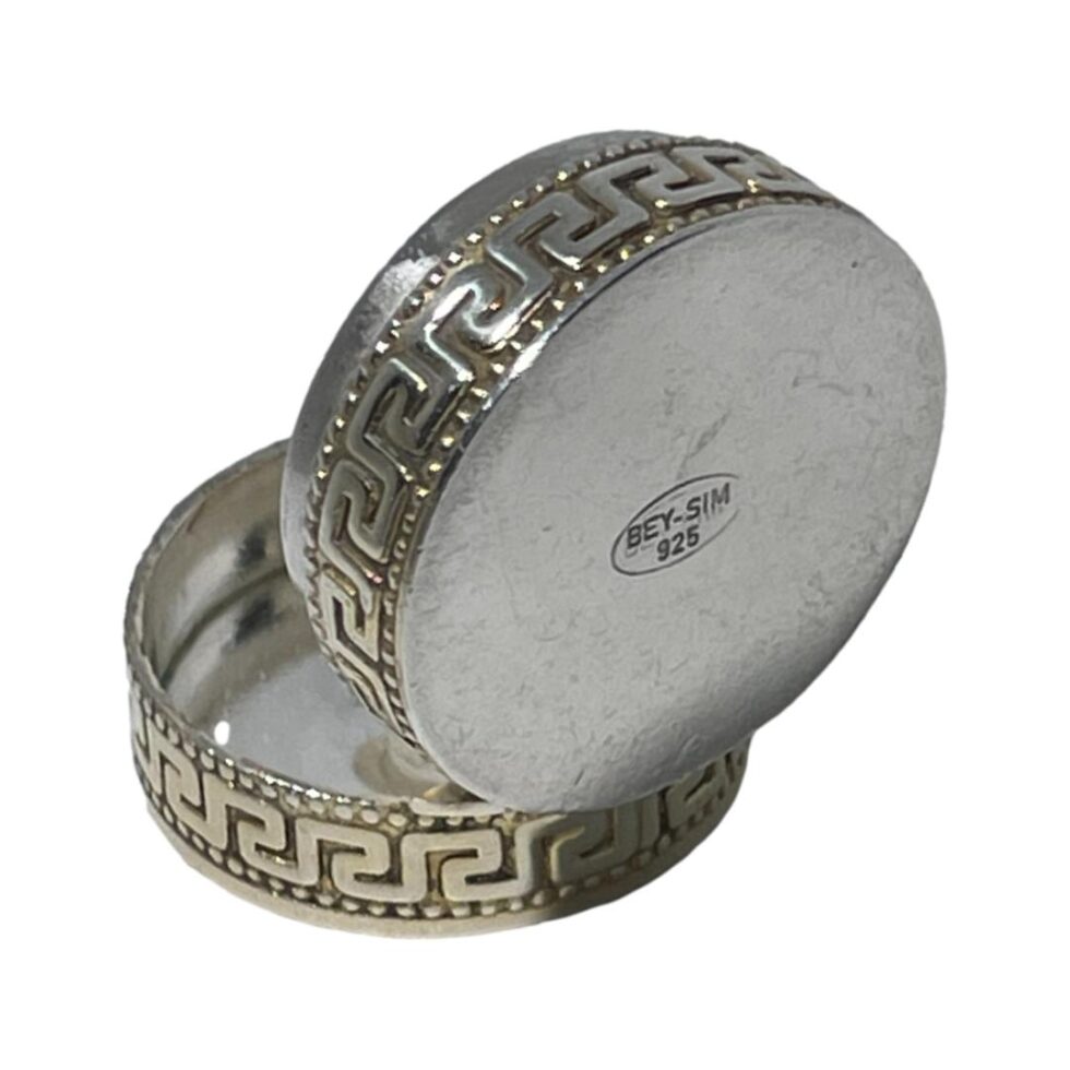 Photo of the silver enamel box shown open with the base of the box on display. The Bey-Sim 925 mark can be seen at the centre.