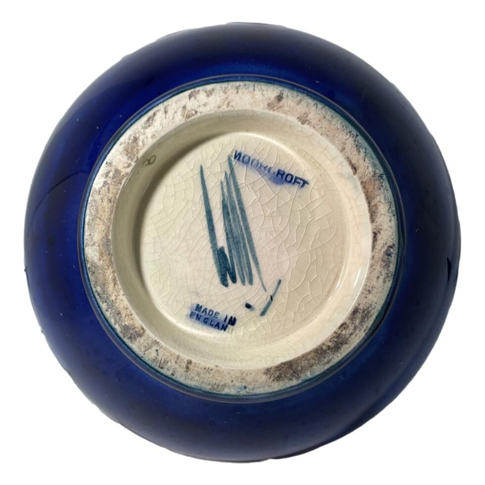 Photo of the base of the Moorcroft vase showing the Moorcroft stamp and William Moorcroft signature.